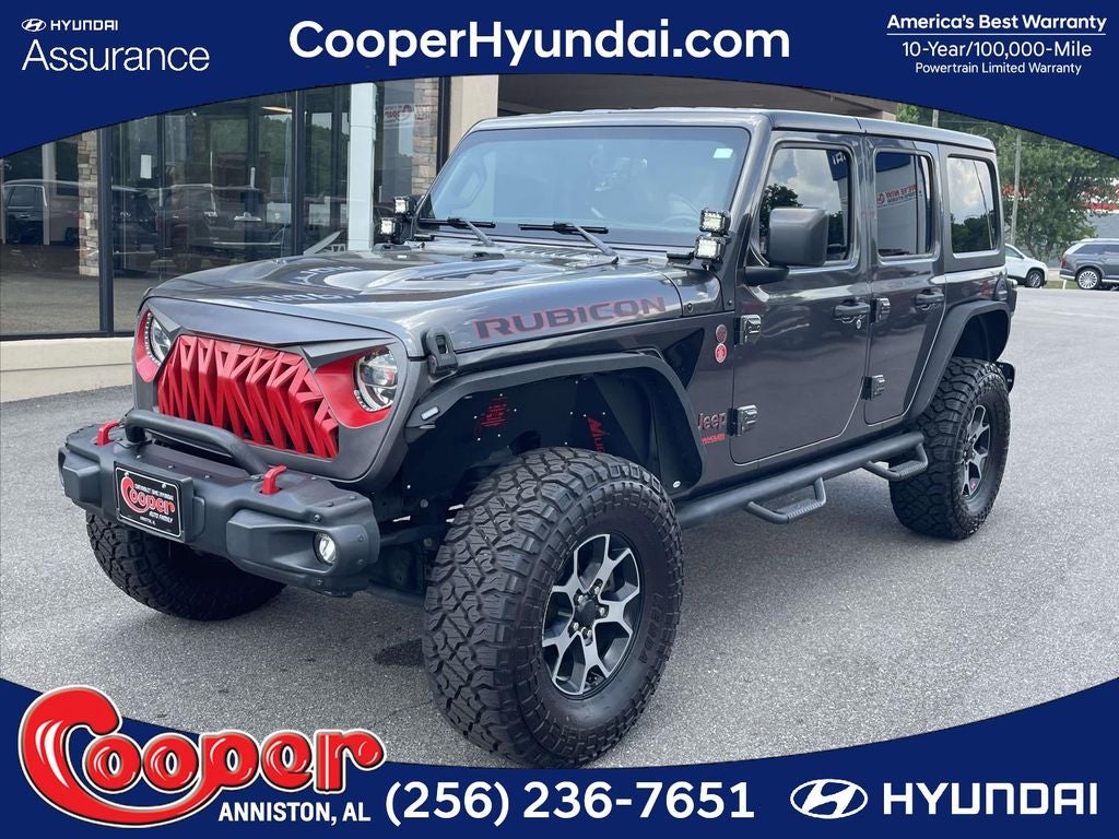 2019 Jeep Wrangler Unlimited Rubicon in Granite Crystal Metallic Clearcoat — front three-quarter view