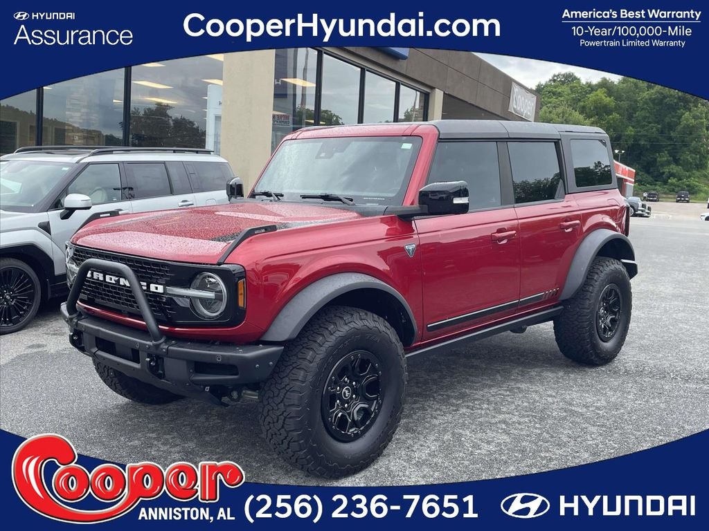 2021 Ford Bronco First Edition in Red Metallic — front three-quarter view