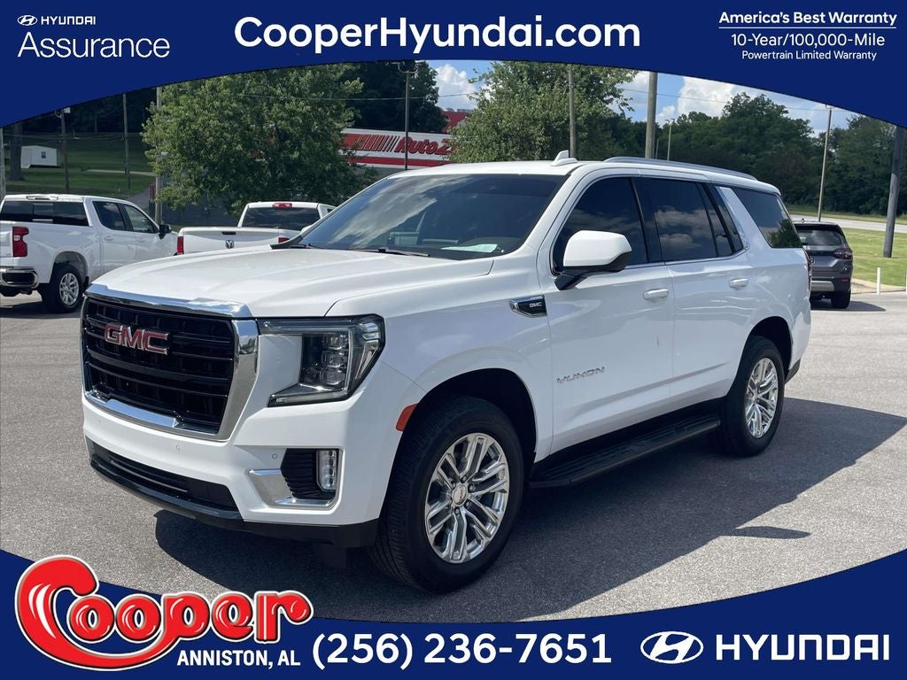 2022 GMC Yukon SLE in Summit White — front three-quarter view