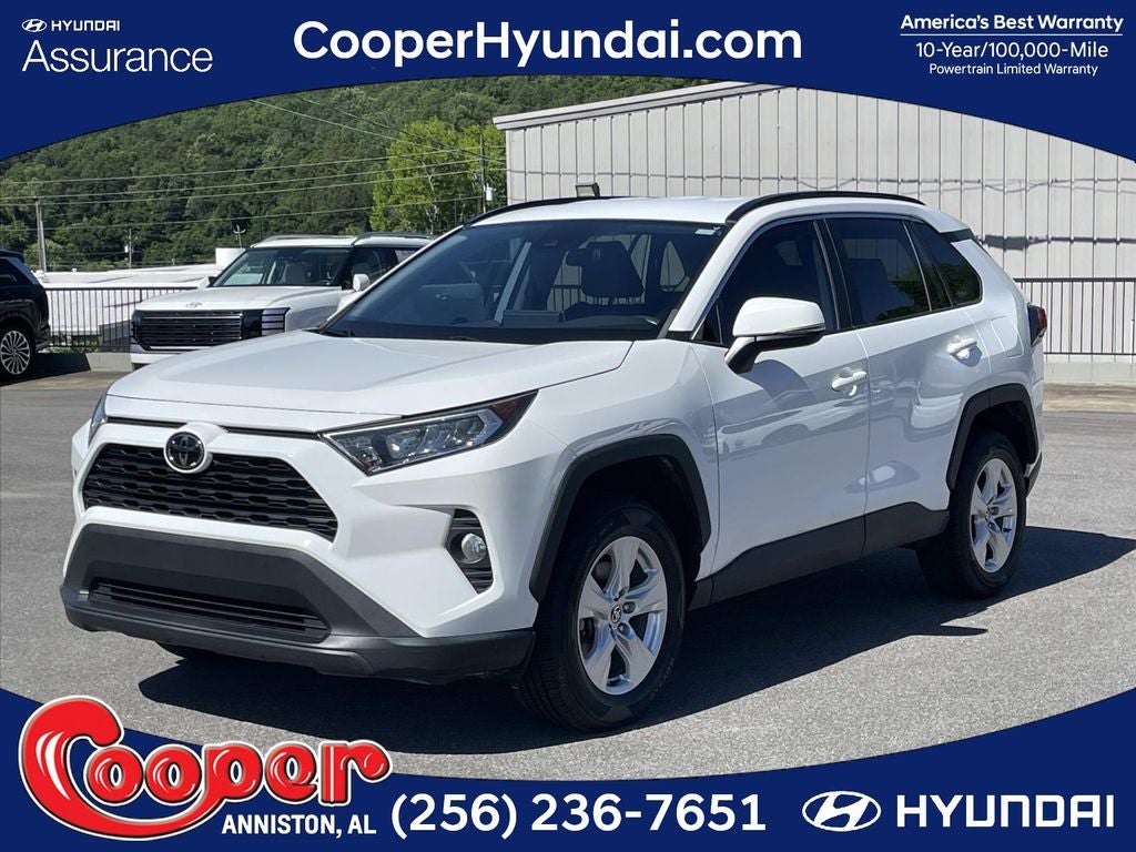 2021 Toyota RAV4 XLE in Super White — front three-quarter view