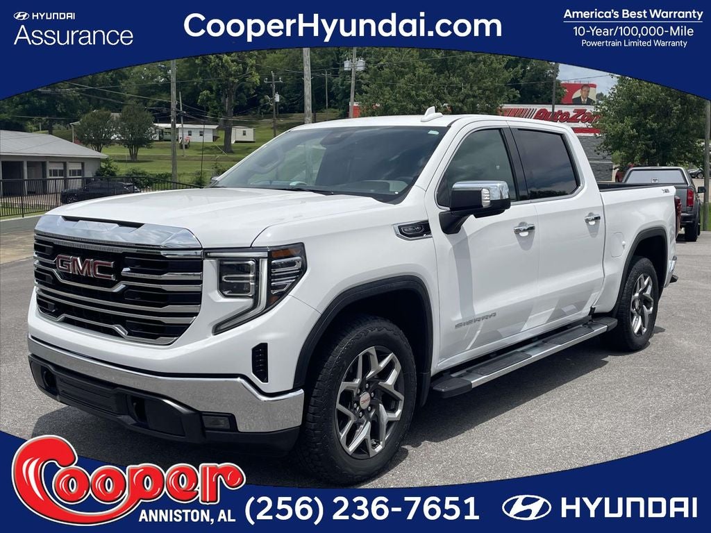 2023 GMC Sierra 1500 SLT in Summit White — front three-quarter view