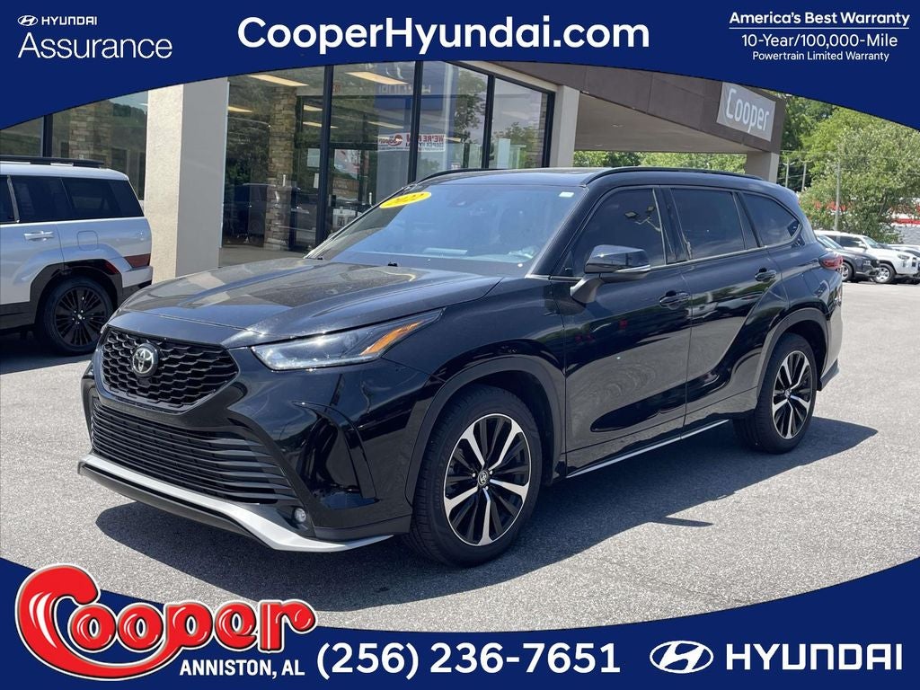 2022 Toyota Highlander XSE in Midnight Black Metallic — front three-quarter view